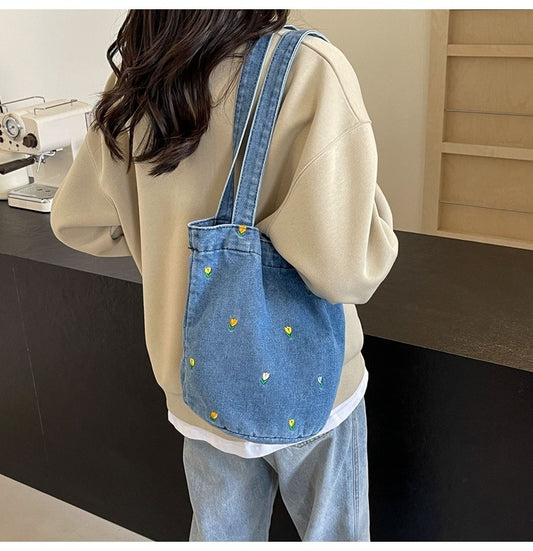 Denim embroidered bucket bag
