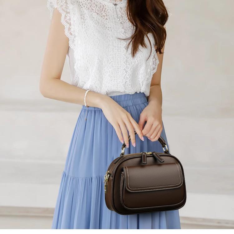 Elegant double-layer shoulder bag with wide strap