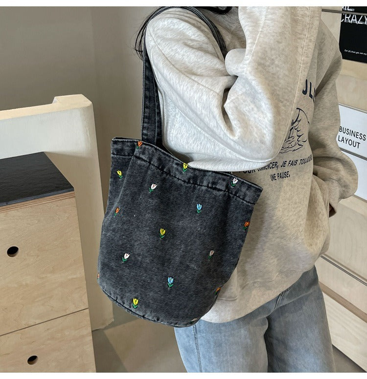 Denim embroidered bucket bag