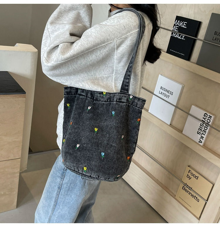 Denim embroidered bucket bag