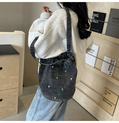 Denim embroidered bucket bag