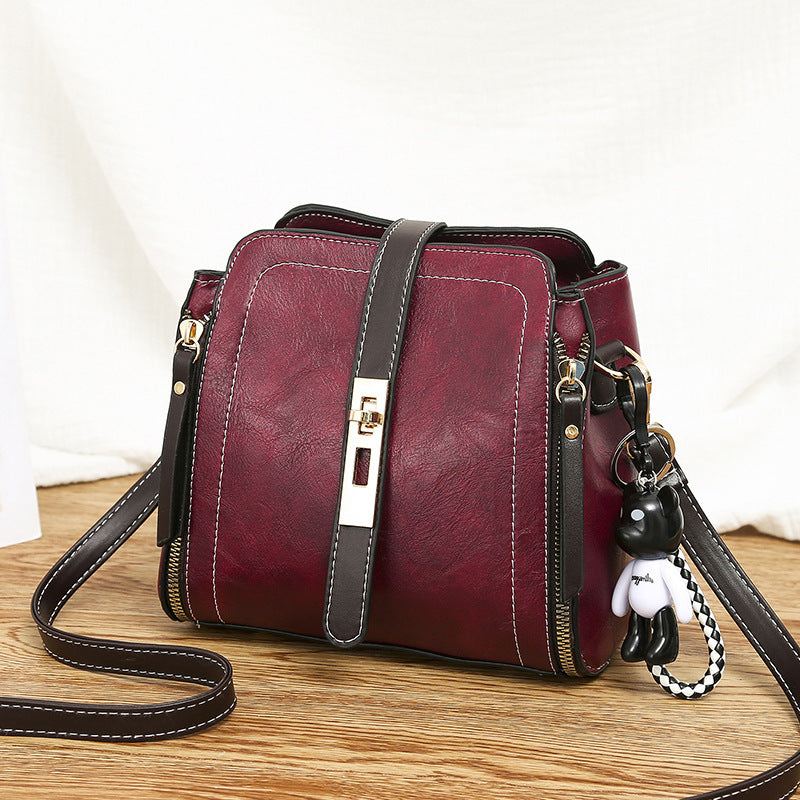 🎁Hot Sale 70% OFF⏳High-Quality PU Crossbody Bag with Doll Decor