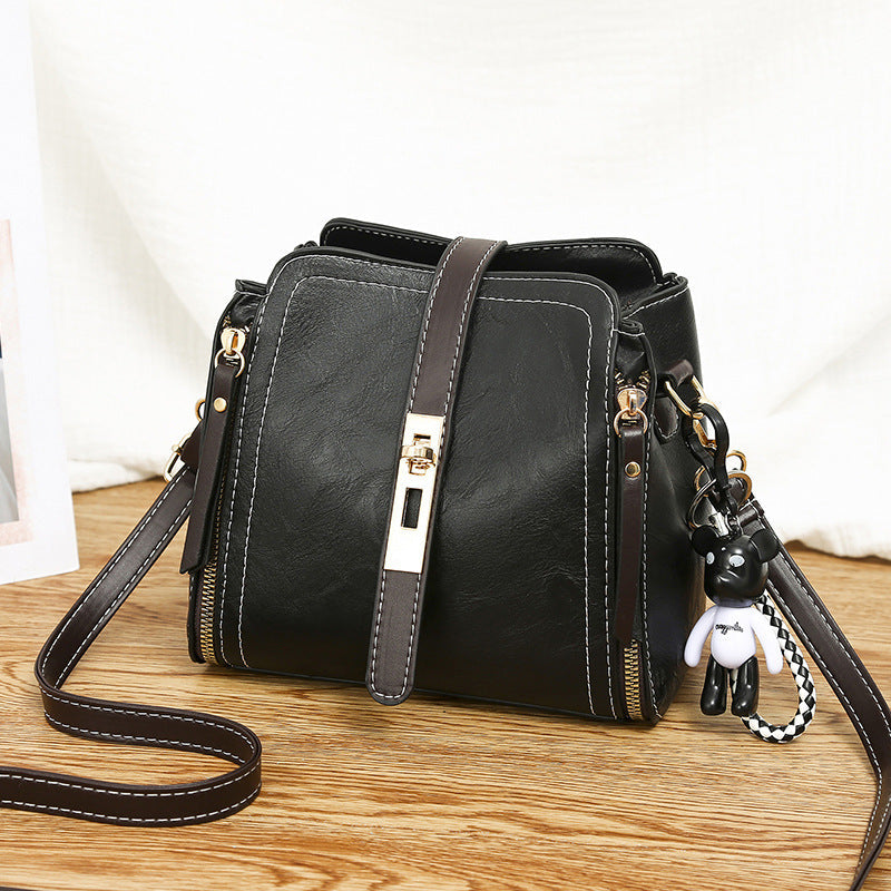 🎁Hot Sale 70% OFF⏳High-Quality PU Crossbody Bag with Doll Decor